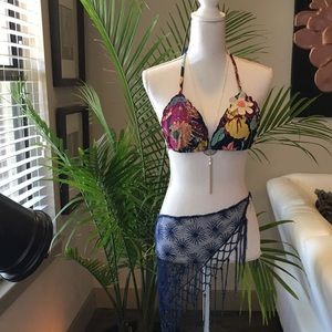 Blue net bikini wrap with blue beads.